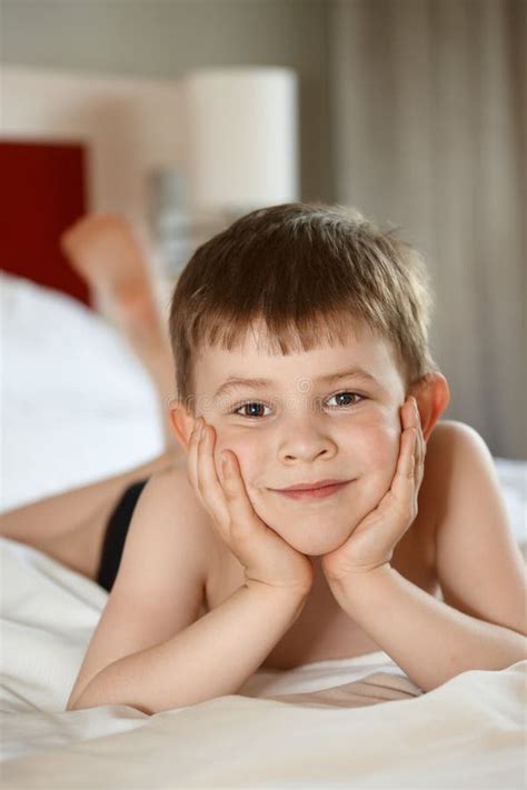 Little Boy Laying On Bed Stock Image Image Of Brown 20170211