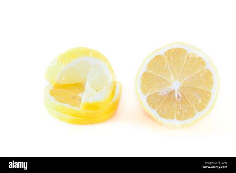 A Pile Of Lemon Slices Isolated On White Background Stock Photo Alamy