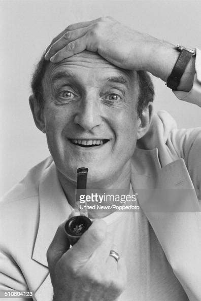 English Actor Ron Moody Posed Holding A Pipe In London On 1st May