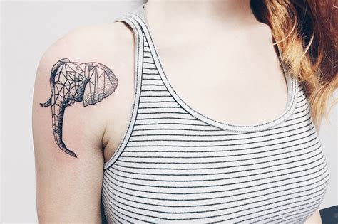 geometric elephant tattoo linework tattoo dotwork tattoo made by boo litjes elephant head