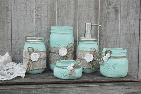 Omg this would be so easy to do.and you could put qtips or cotton balls in. Mint green bathroom set | Mason jar bathroom, Bathroom ...