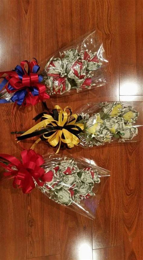 Maybe you would like to learn more about one of these? Half a dozen $1 bill money rose with babies breath bouquets for graduation gifts made by ...