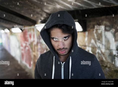 Portrait Menacing Young Man In Urban Tunnel Stock Photo Alamy