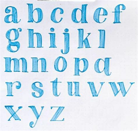 The Upper And Lower Letters Are Drawn With Blue Marker On White Paper