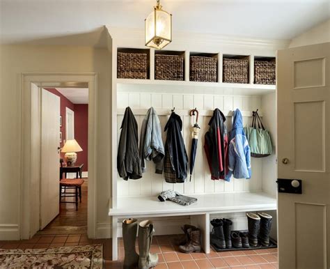 An Image Of A Coat Rack With Umbrellas And Boots Hanging From Its Hooks