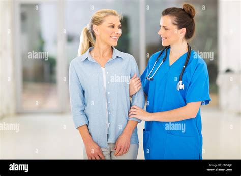 Caring Female Medical Doctor Talking To Senior Patient Stock Photo Alamy