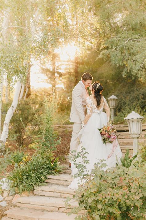 Ethereal Outdoor Wedding Inspiration Bride And Groom Walking Up Stairs