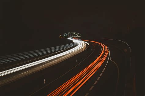 Time Lapse Photography Of Vehicles On Road During Nightime · Free Stock