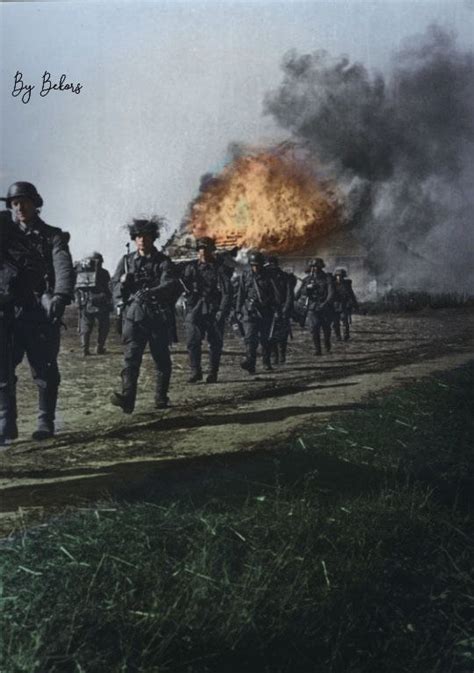 German Soldiers March Past A Burning Home Ukraine October 1941