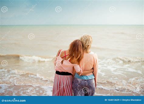Adult Daughter Hugs Mom On The Sea Shore Stock Image Image Of Happy