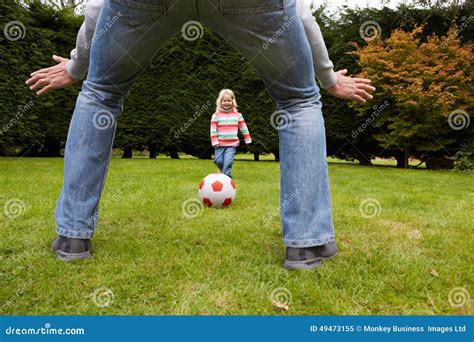 Father And Daughter Playing Football In Garden Together Stock Image Image Of Nature Girl