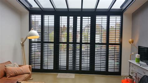 Our administrative and manufacturing facilities are all under one roof to ensure prompt. zwarte shutters met vouwrailsysteem . www ...