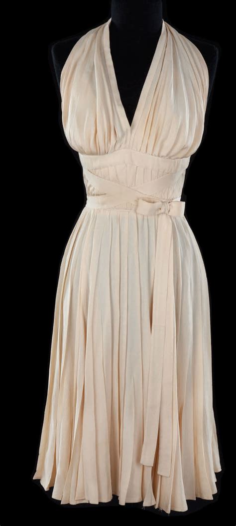 The dress is regarded as an icon of film history and the image of monroe in the white dress standing above a subway grating blowing the dress up has been described as one of the iconic. Marilyn Monroe ivory subway dress from Seven Year Itch ...