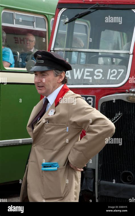 Bus Driver For Wensleydale Vintage Bus Service Standing Before His