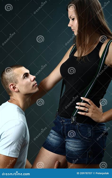 Young Man Kneels Before His Girlfriend Stock Image Image Of Romence