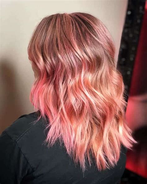 Dark brown hair with light pink highlights