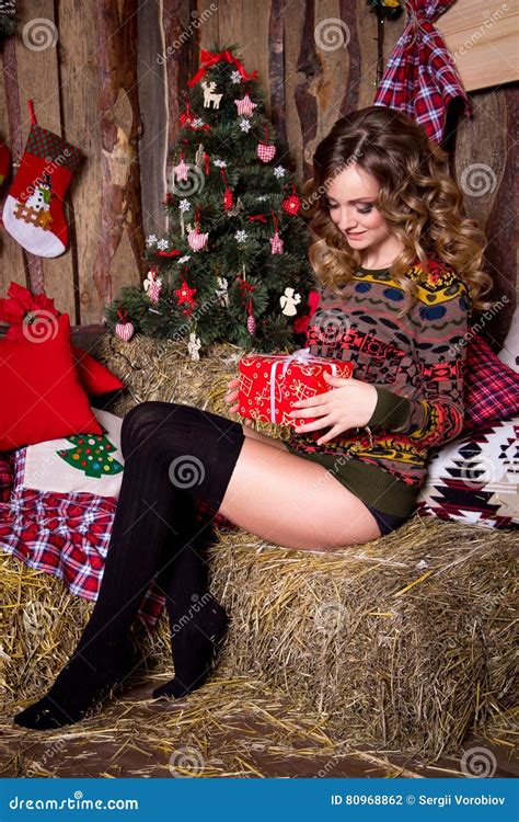 sexy smiling girl near christmas tree royalty free stock image 11592808