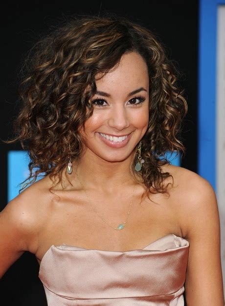 You just need a braid then turn into a braid with choppy bangs for this playful look. Medium natural curly hairstyles