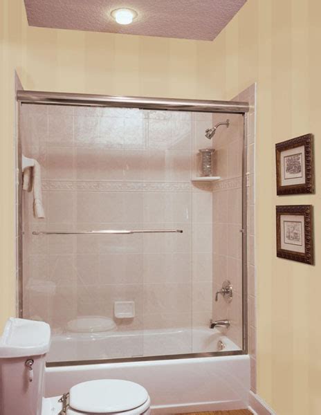 This bathtub shower door is actually an enigma; Shower and Tub Enclosure Ideas from River Glass Designs