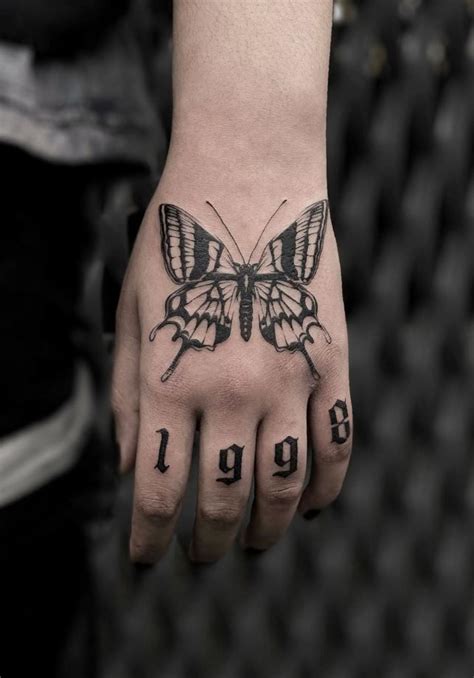 Butterfly Tattoo Get An Inkget An Ink Hand Tattoos For Guys