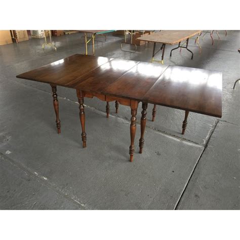 It's also an ideal addition to the family room to spread out games, puzzles, or to use as an additional workspace. Drop Leaf Extension Dining Table Walter of Wabash | Chairish