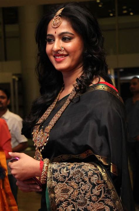 Indian Actress Anushka Shetty Stills At Fashion Show In Black Saree
