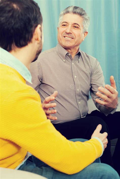 Old Father And Son Friendly Conversation Stock Image Image Of Talking