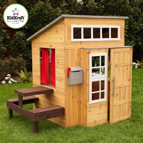 The gable end walls feature a window and full trim work. How to Build a Playhouse with Wooden Pallets (Step-by-Step ...