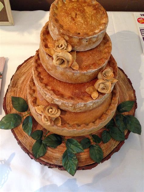 Brown ground beef and ground pork over medium heat until thoroughly cooked. Homemade 4 tier pork pie 'cake' with handmade pastry roses ...