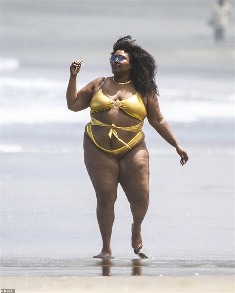 Lizzo Flies The Flag For Body Positivity As She Hits The Beach In Gold