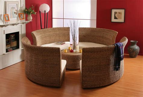 Plus, this blend of teak wood and resin wicker stands up to sunny and wet weather without fading, rusting, or molding. room, Round Sofa Design In Red Wall Living Room With ...