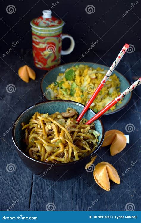 Chinese Lo Mein Noodles In Bowl With Fortune Cookies Stock Photo