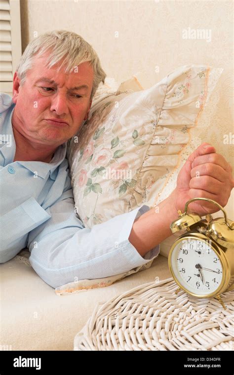Grumpy Old Man Waking Up In The Morning Stock Photo Alamy