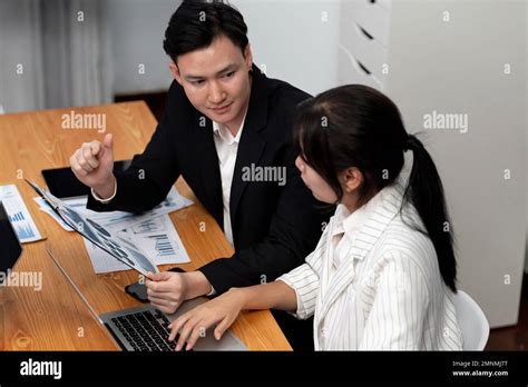 Harmony in office concept as business people analyzing dashboard paper