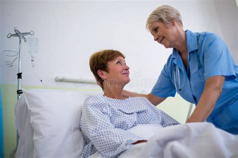Nurse Talking To A Senior Patient Stock Photo Image Of Medical