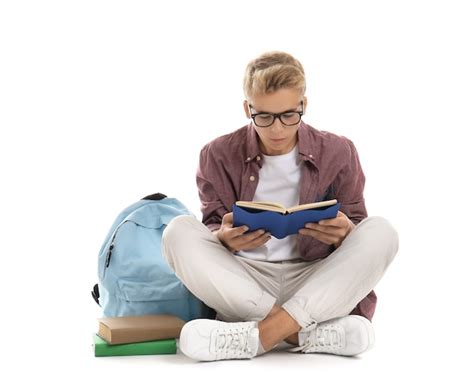 Premium Photo Teenage Boy Reading Book Isolated