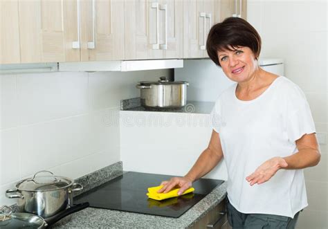 Mature Woman Cleaning Stock Image Image Of Apartment 219163041