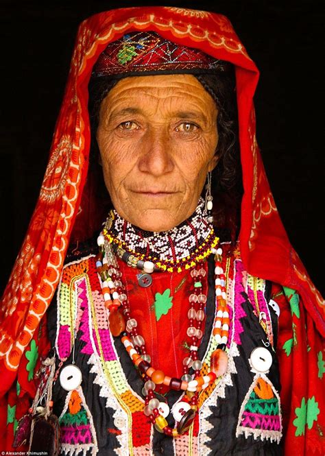 A Picture Of A Wakhi Woman Pictured Dressed In A Brightly Coloured