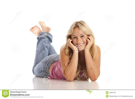 Young Girl With Jeans Laying On Floor Royalty Free Stock