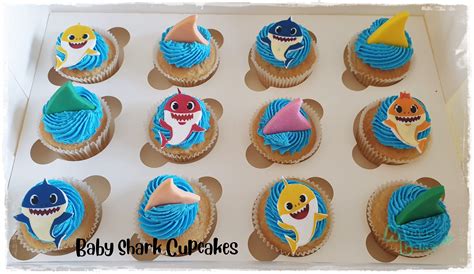 Baby Shark Themed Cupcakes With Fondant Shark Fins And Edible Image