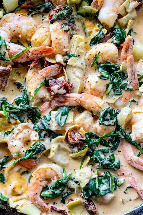 This creamy garlic butter tuscan shrimp pasta has really great flavor and the majority of it, other than cooking the orzo pasta, is done in one pan. EASY TUSCAN SHRIMP PASTA + WonkyWonderful