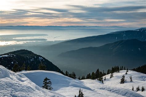 Snow Covered Mountains During Dusk · Free Stock Photo