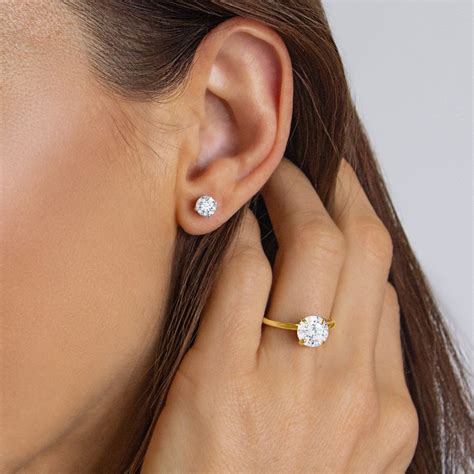 Yellow gold pave halo diamond engagement ring (oval center). Simple Engagement Rings