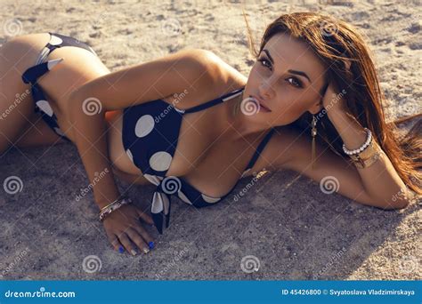 Pretty Brunette In Bikini Relaxing On Summer Beach Stock Photo Image