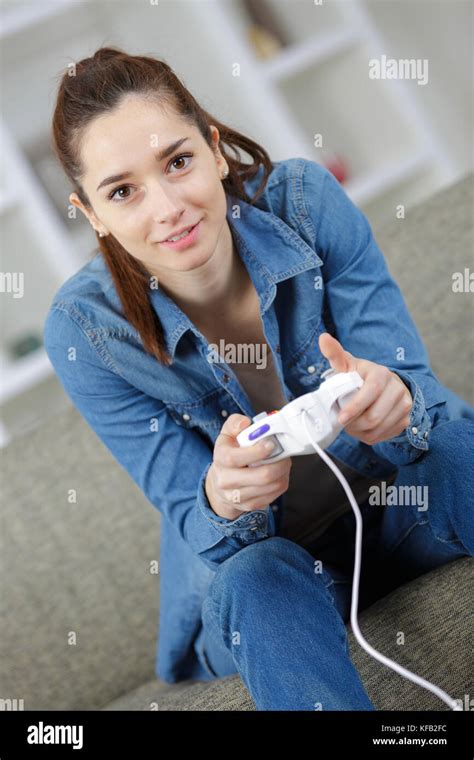Girl Playing Video Games Holding Joypad Stock Photo Alamy