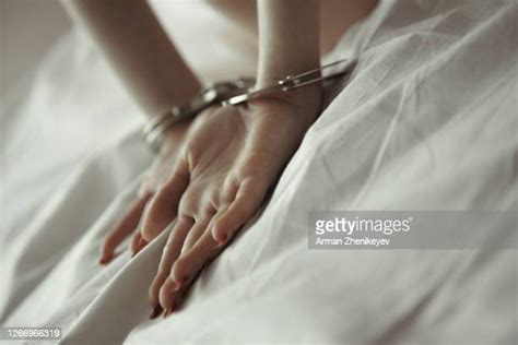 Handcuffs Bed Photos Et Images De Collection Getty Images