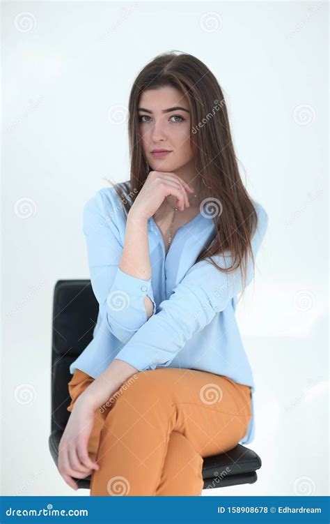 Close Up Young Businesswoman Sitting On An Office Chair Stock Photo
