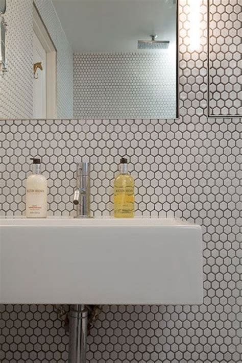 More and more floor & decor customers are using black and white hexagons … the softer shade of black and the matte finish cuts the otherwise harsh contrast between black and white tile, giving this bathroom a sunnier appearance where the midcentury modern vanity and antique bath mat can. 24 black and white hexagon bathroom tile ideas and ...