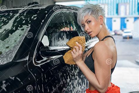 Young Woman Washes A Car In A Car Wash Stock Image Image Of Caucasian Lifestyle 180987445