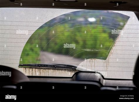 Dirty Car Back Window In The Dust View From Inside The Car Through